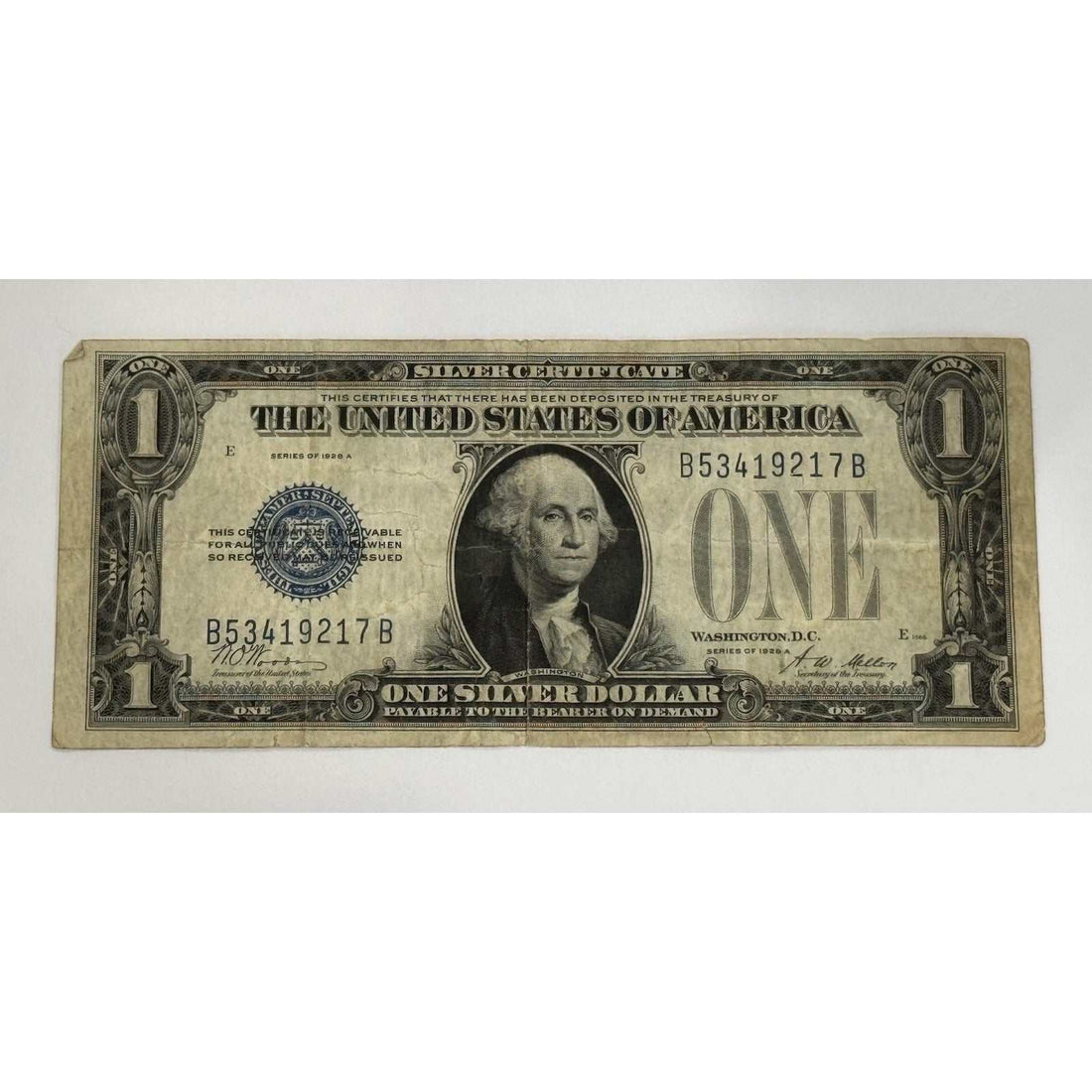 1928-A $1 Silver Certificate vintage circulated U.S. currency note with Funny Back design and George Washington portrait