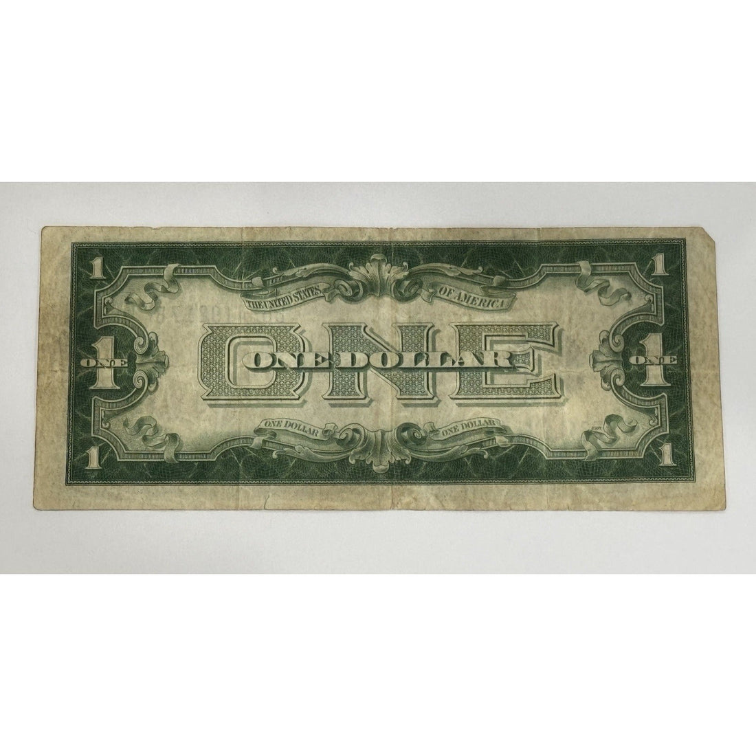 1928-A $1 Silver Certificate vintage circulated U.S. currency note with Funny Back design and George Washington portrait