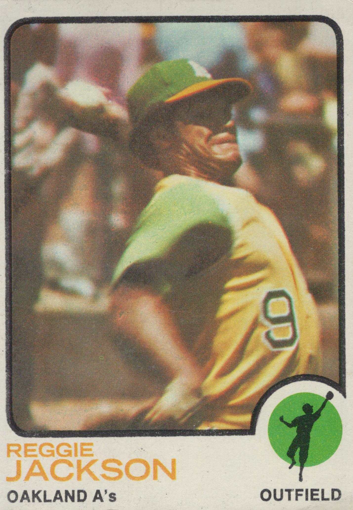 1973 MLB Reggie Jackson Oakland A’s vintage Topps baseball card HOF slugger in protective sleeve