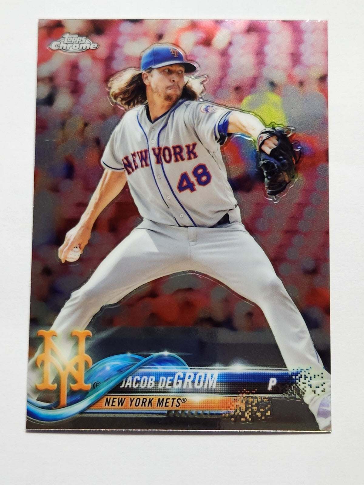 Topps Chrome 2018 Baseball Card #143 Jacob DeGrom NY Mets pitcher in action with team logo and holographic design