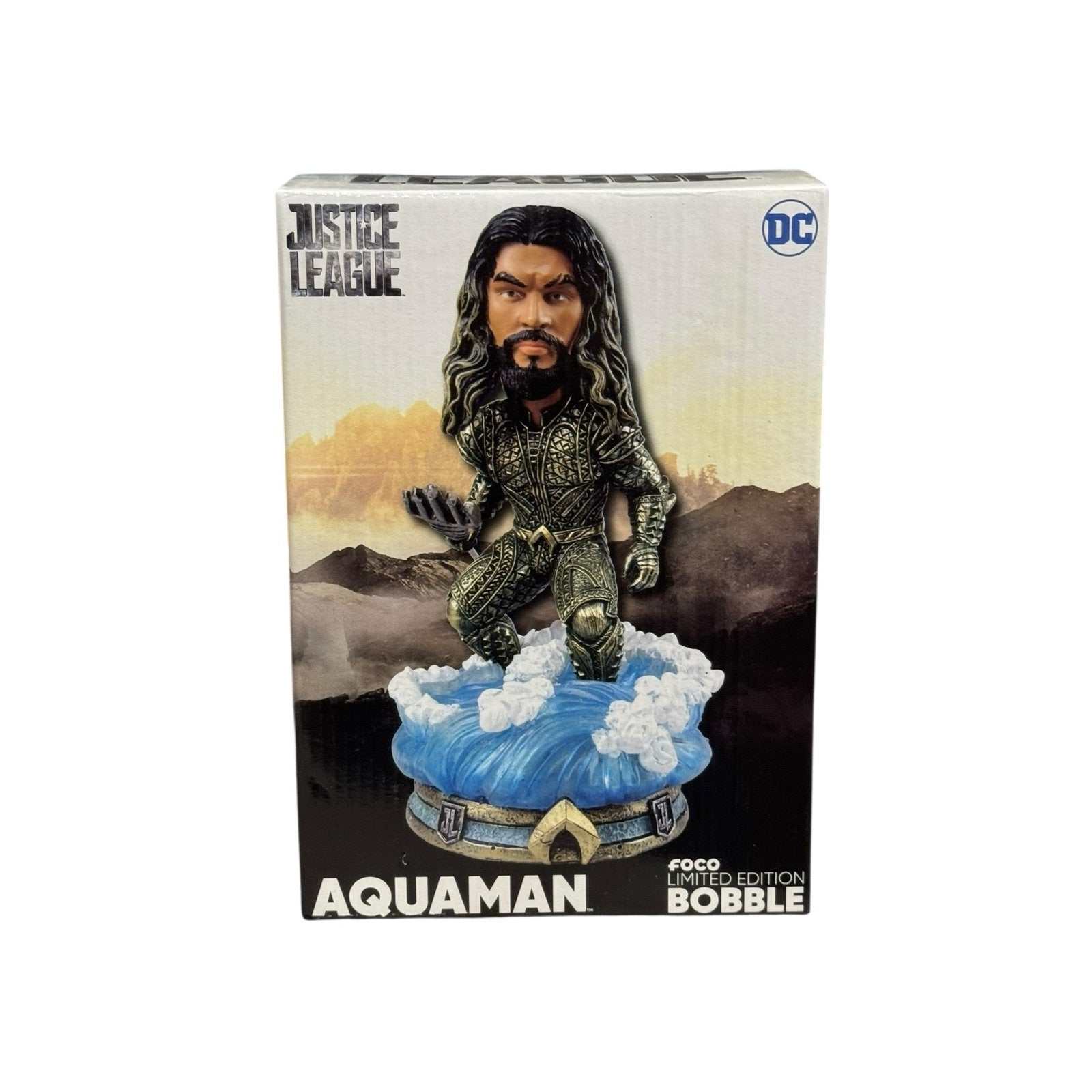 Justice League Aquaman FOCO Limited Edition bobblehead collectible figure in detailed armor on ocean base packaging