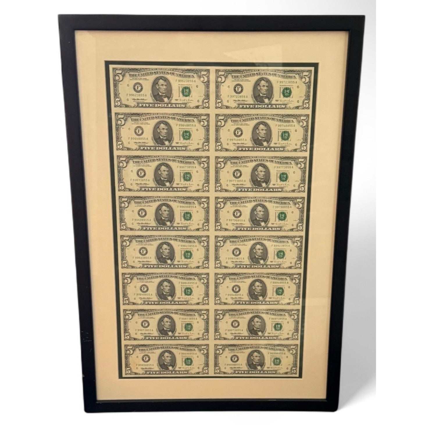 Framed Series 1995 Uncut Sheet of sixteen $5 bills with consecutive serial numbers