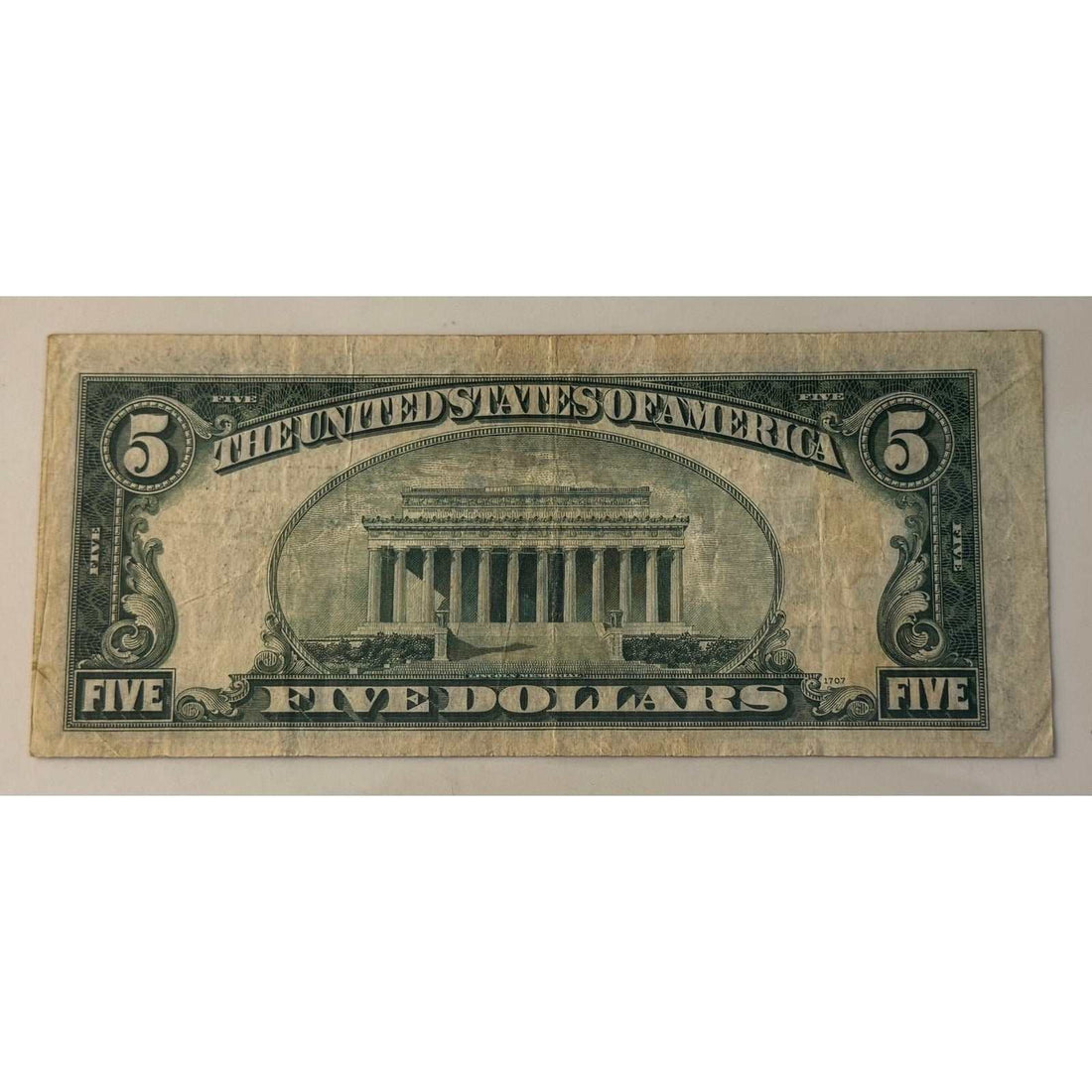 1934 C 5 Silver Certificate with Abraham Lincoln and blue seal worn vintage US currency note