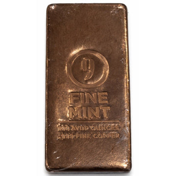 100 oz Copper Bar 9Fine Mint .999 fine copper bullion with poured texture and mint hallmark in original wrapping weighing 7 lb