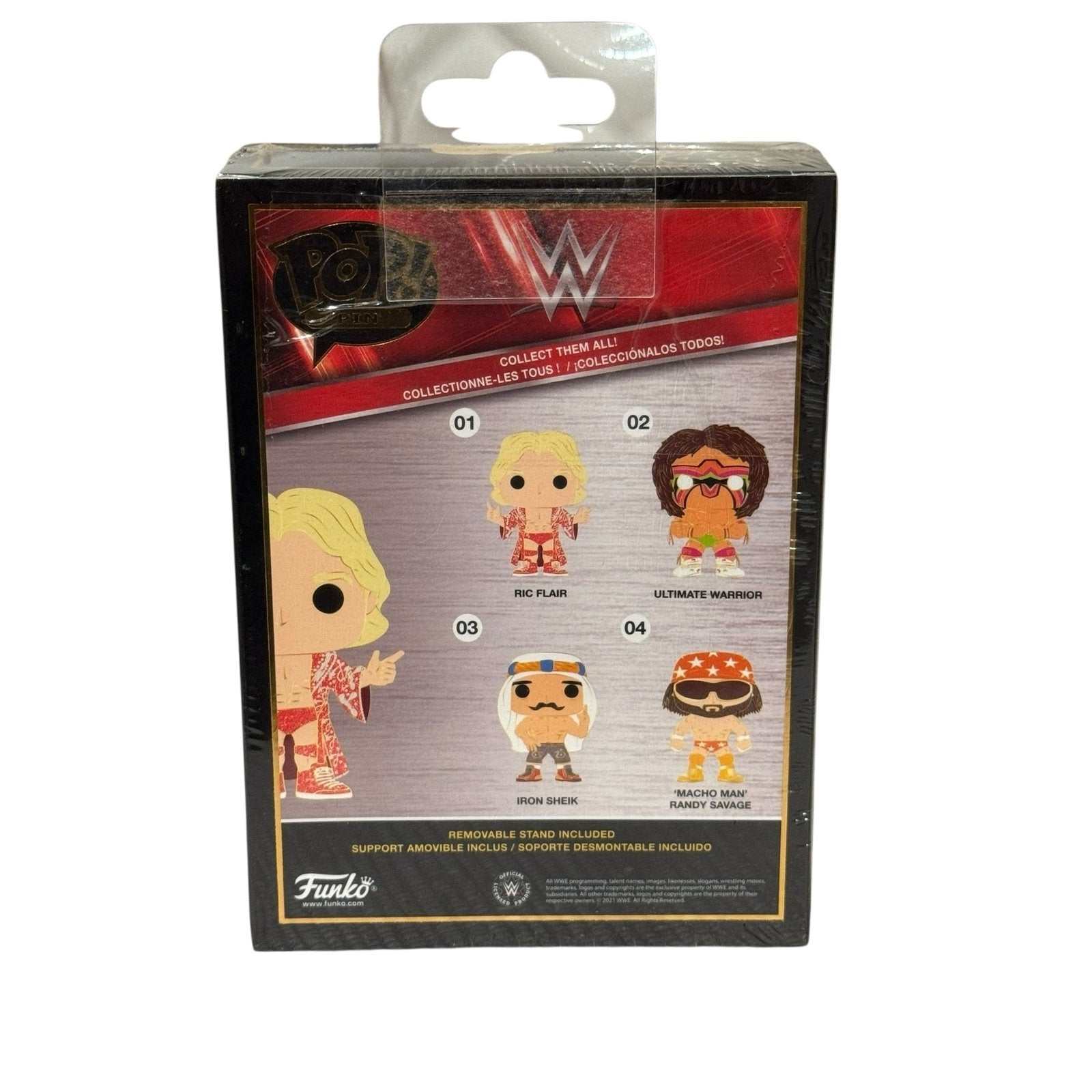 Funko Pop Pin WWE Ric Flair collectible enamel pin in packaging with WWE wrestlers display