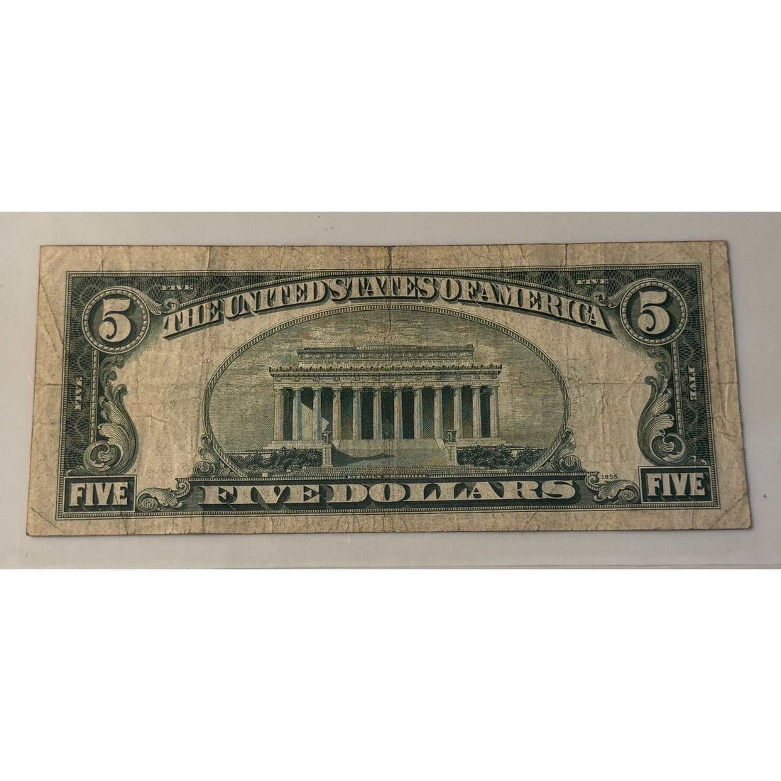 1934 C 5 Silver Certificate US currency with Abraham Lincoln and blue seal