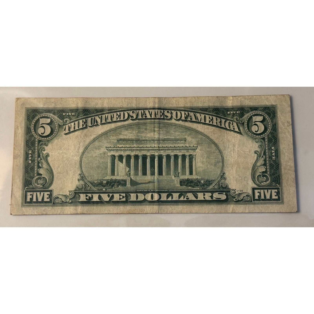 1934 C 5 Silver Certificate vintage US currency with Abraham Lincoln and blue seal
