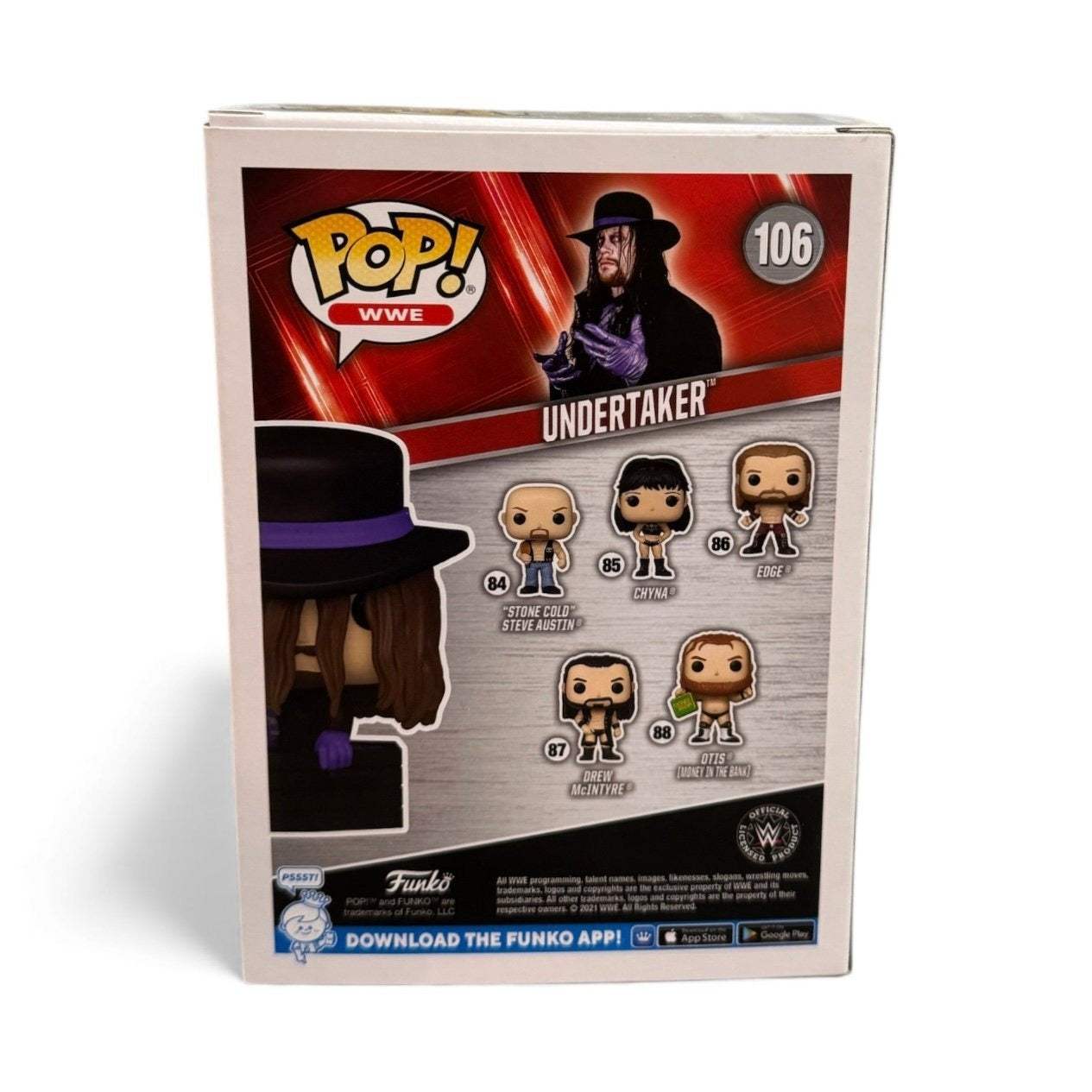 Funko POP WWE Undertaker #106 limited edition GameStop exclusive figure in box with purple gloves and hat.