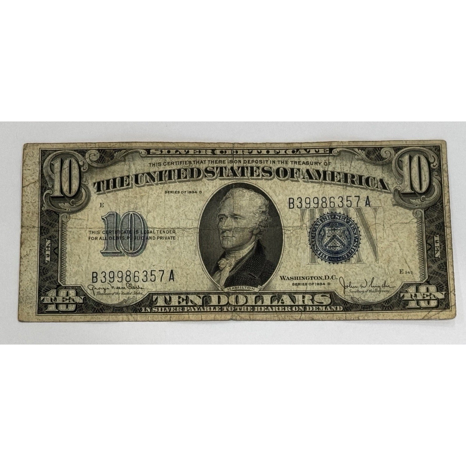 1934-D $10 Silver Certificate featuring Alexander Hamilton and blue Treasury seal vintage U.S. currency note