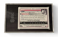 2022 Bowman’s Best University baseball card back with player stats and biography in protective case