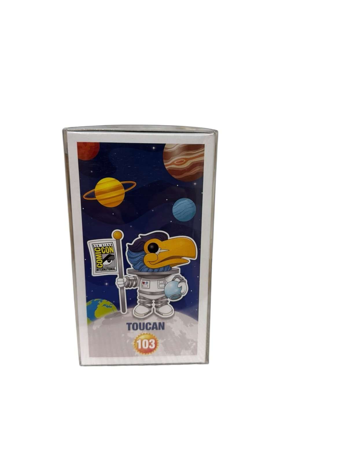 Funko Pop Toucan 103 SDCC Limited Edition Comic Con Exclusive collectible figure in astronaut outfit with planets background
