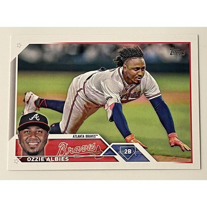 Ozzie Albies 2023 Topps Series 1 MLB Atlanta Braves baseball card showing Albies sliding into base