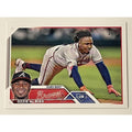 Ozzie Albies 2023 Topps Series 1 MLB Atlanta Braves baseball card showing Albies sliding into base