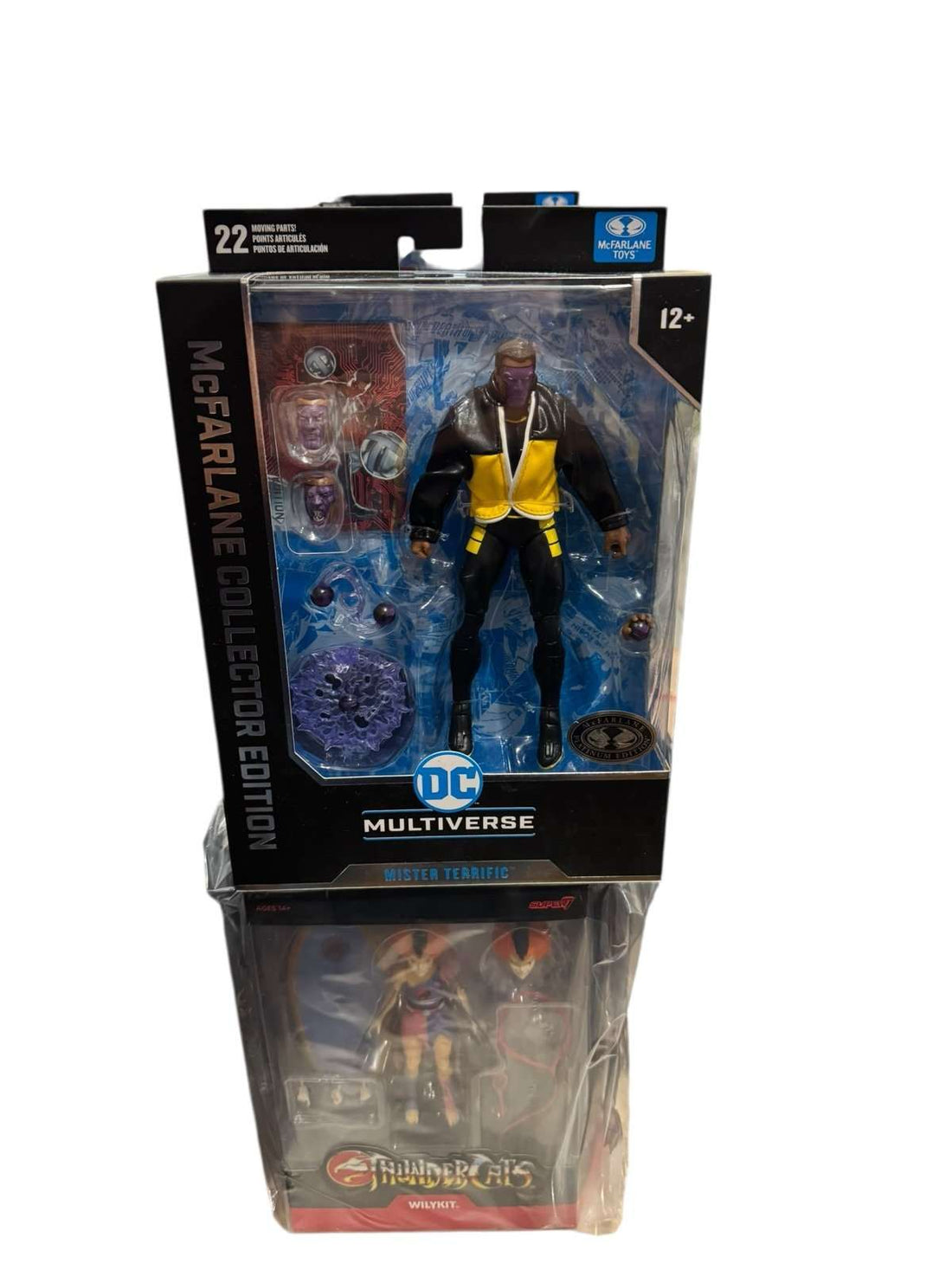 McFarlane DC Multiverse Mister Terrific Collector Edition action figure in sealed packaging with accessories and display stand