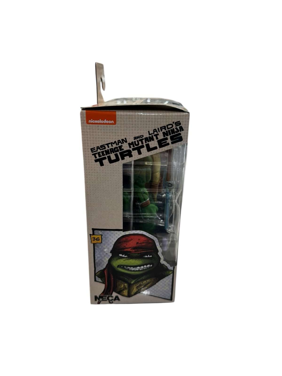 NECA Teenage Mutant Ninja Turtles Donatello Handyman vinyl figure in sealed box with comic style packaging