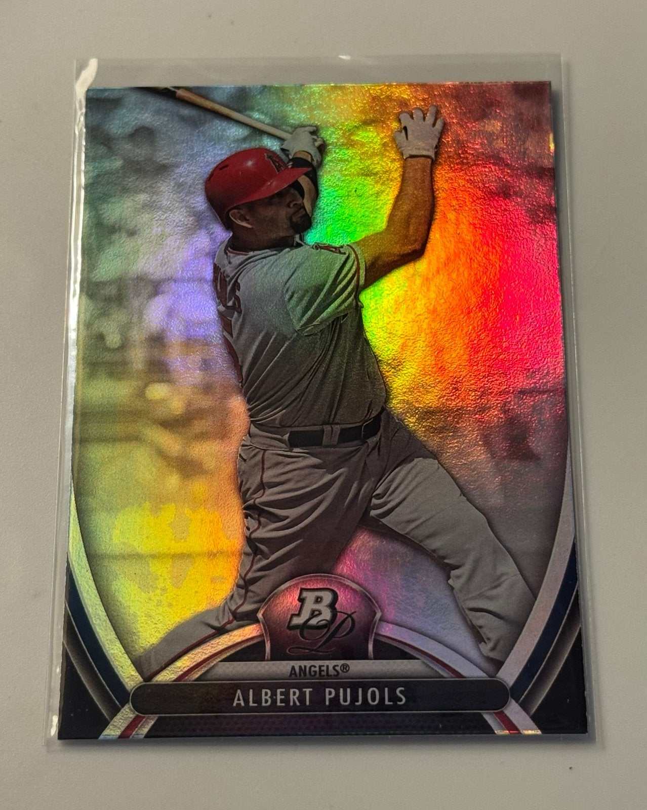 2013 Bowman Platinum Moments baseball card of Albert Pujols in Los Angeles Angels uniform hitting bat