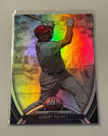 2013 Bowman Platinum Moments baseball card of Albert Pujols in Los Angeles Angels uniform hitting bat