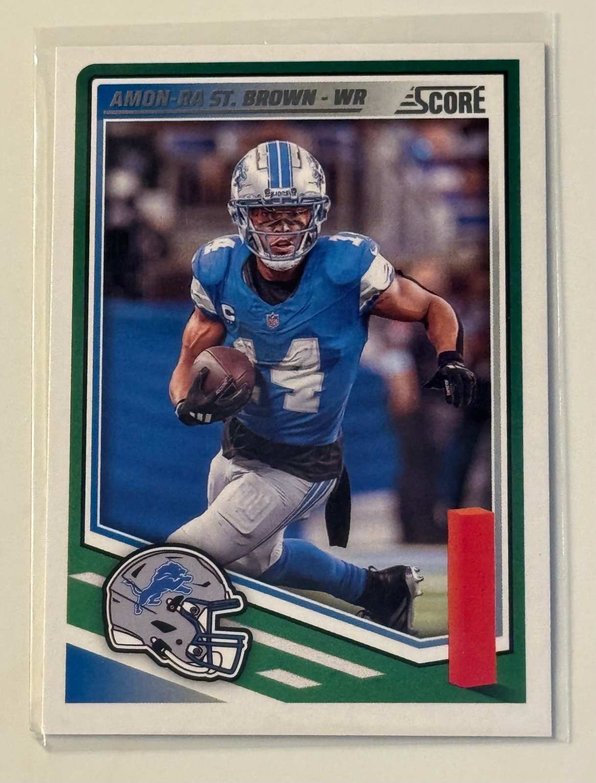 2025 Panini Score Amon-Ra St Brown Detroit Lions WR football card #142 mint condition
