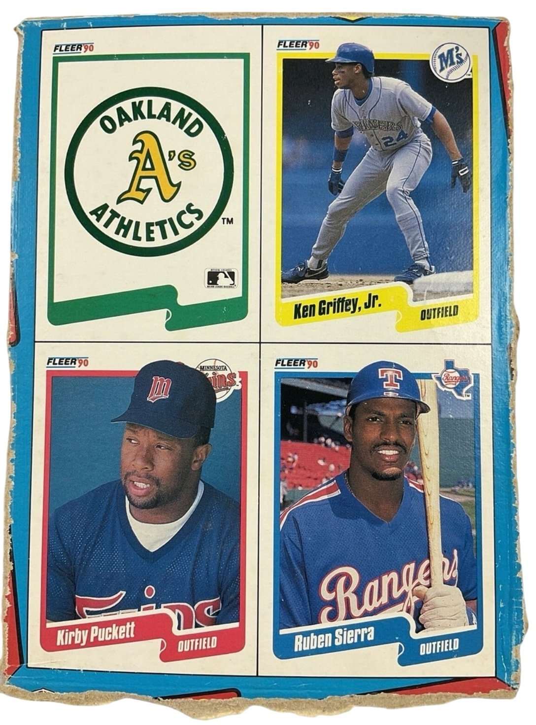 1990 Fleer Baseball Factory Set sealed box with Ken Griffey Jr rookie card, Kirby Puckett, Ruben Sierra, and 672 cards plus 45 logo stickers