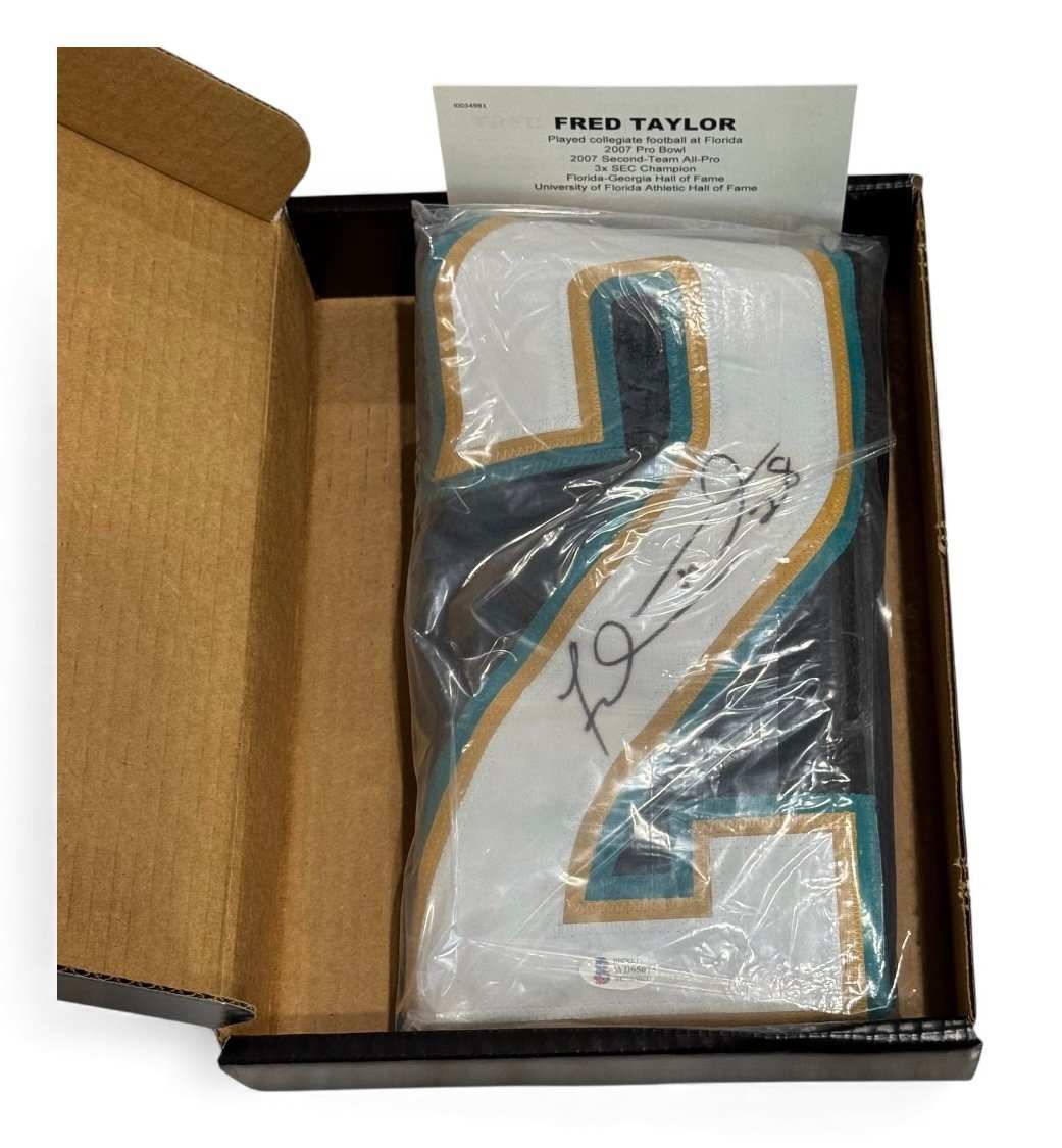 Fred Taylor autographed Jacksonville Jaguars #28 jersey in original TriStar box with COA