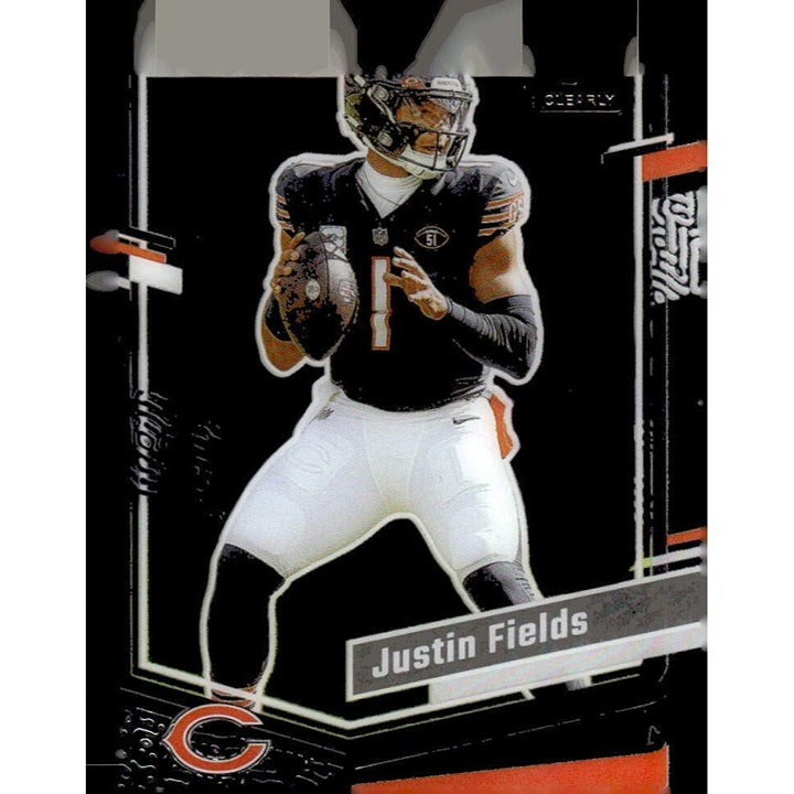 Justin Fields 2023 Panini Donruss CLEAR Series NFL Bears football card #10 showing quarterback in action