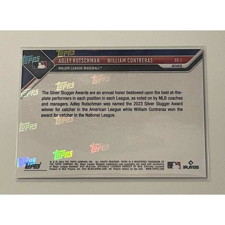 2023 TOPPS NOW Silver Slugger Award card featuring Adley Rutschman and William Contreras in action with team logos on front