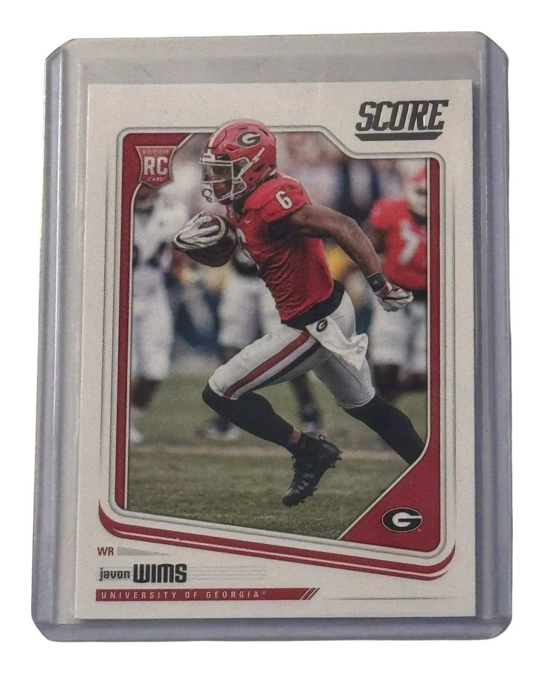 Javon Wims RC 2018 Score Georgia Bulldogs rookie card running with football in clear protective case