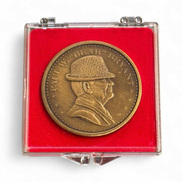 1982 Paul Bear Bryant bronze coin with Alabama coach profile in display case