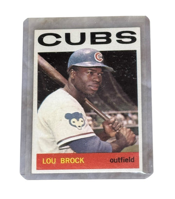 Vintage 1969 Topps MLB baseball card of Lou Brock Chicago Cubs outfield with classic design