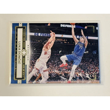 2023-24 Luka Doncic Panini PhotoGenic NBA Dallas Mavericks basketball card #105 with Silver parallel