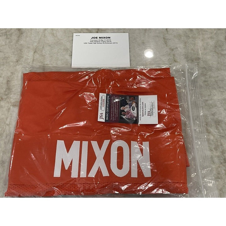 Joe Mixon autographed Cincinnati Bengals NFL football jersey with JSA certificate in packaging