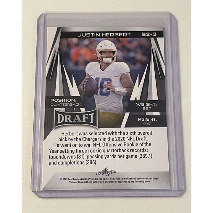 2023 Leaf Draft Picks Justin Herbert blue parallel NFL LA Chargers trading card in protective case