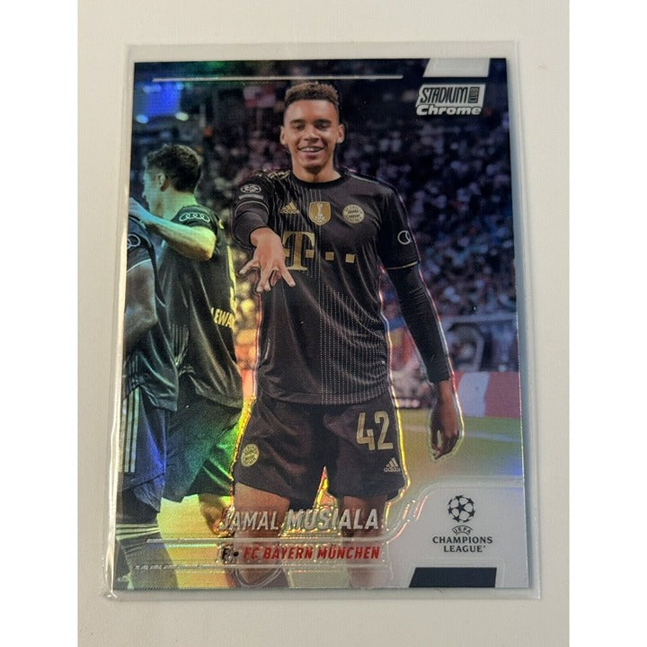 Jamal Musiala 2021-22 Topps UEFA Stadium Club Chrome Prism Refractor soccer trading card of Bayern Munich player in black uniform with blue prism effect