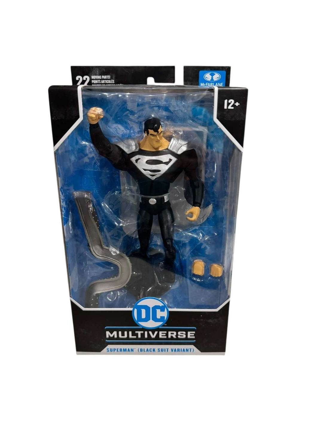 McFarlane DC Multiverse Superman black suit variant 7-inch action figure in sealed packaging with flight stand and alternate hands