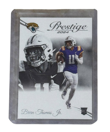 Brian Thomas Jr 2024 Prestige rookie football card Jacksonville Jaguars WR in protective case