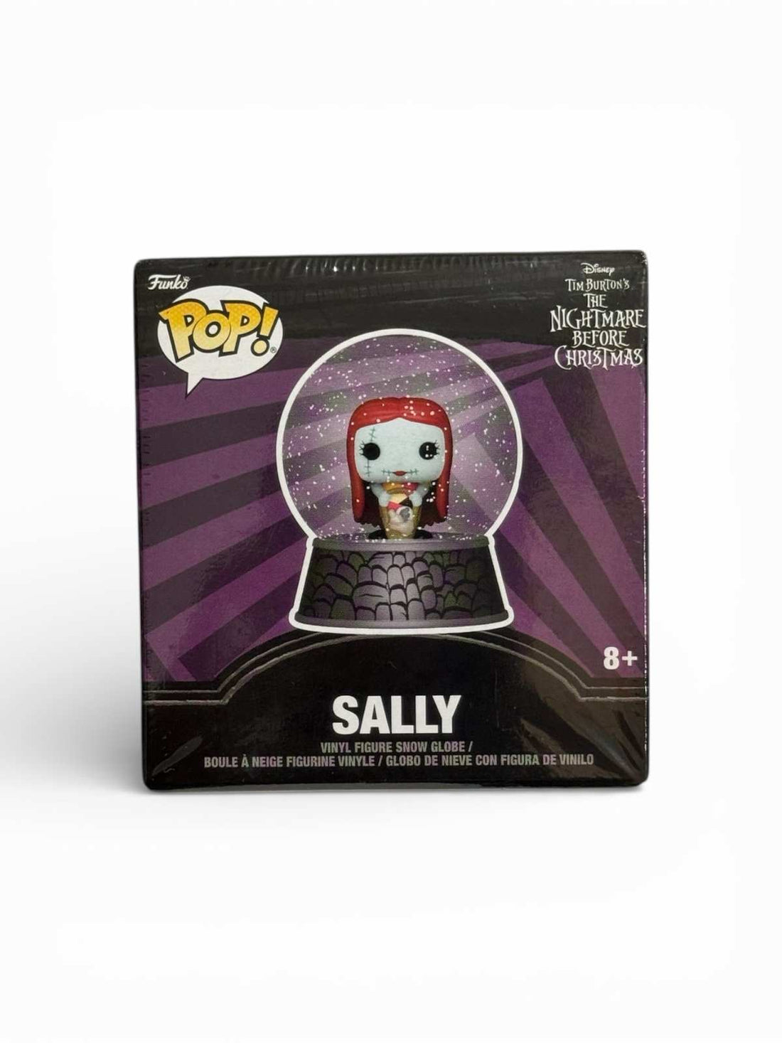 Sally vinyl figure snow globe from Nightmare Before Christmas in boxed display with glitter snow accents