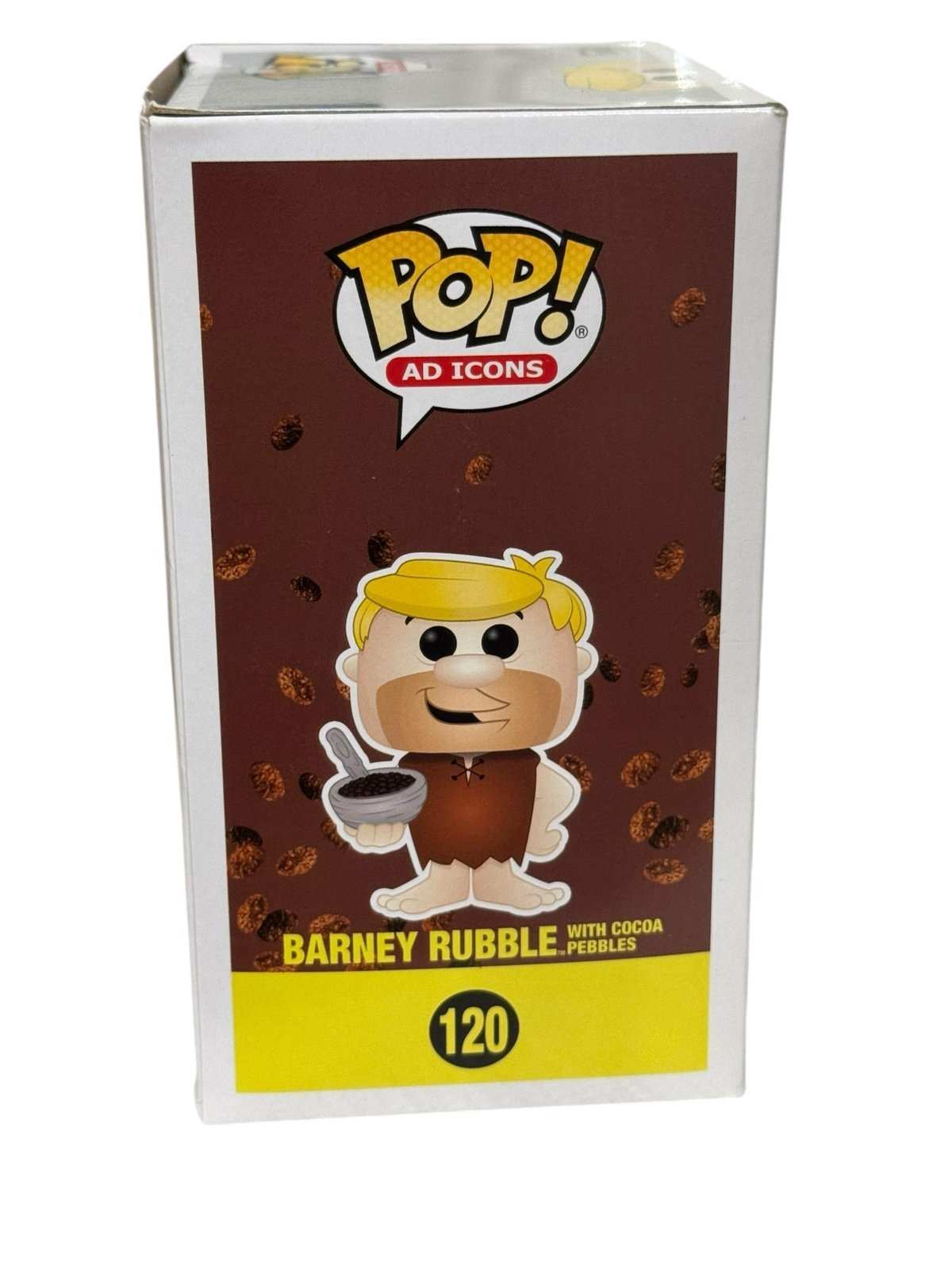Barney Rubble Funko Pop holding Cocoa Pebbles collectible box front view