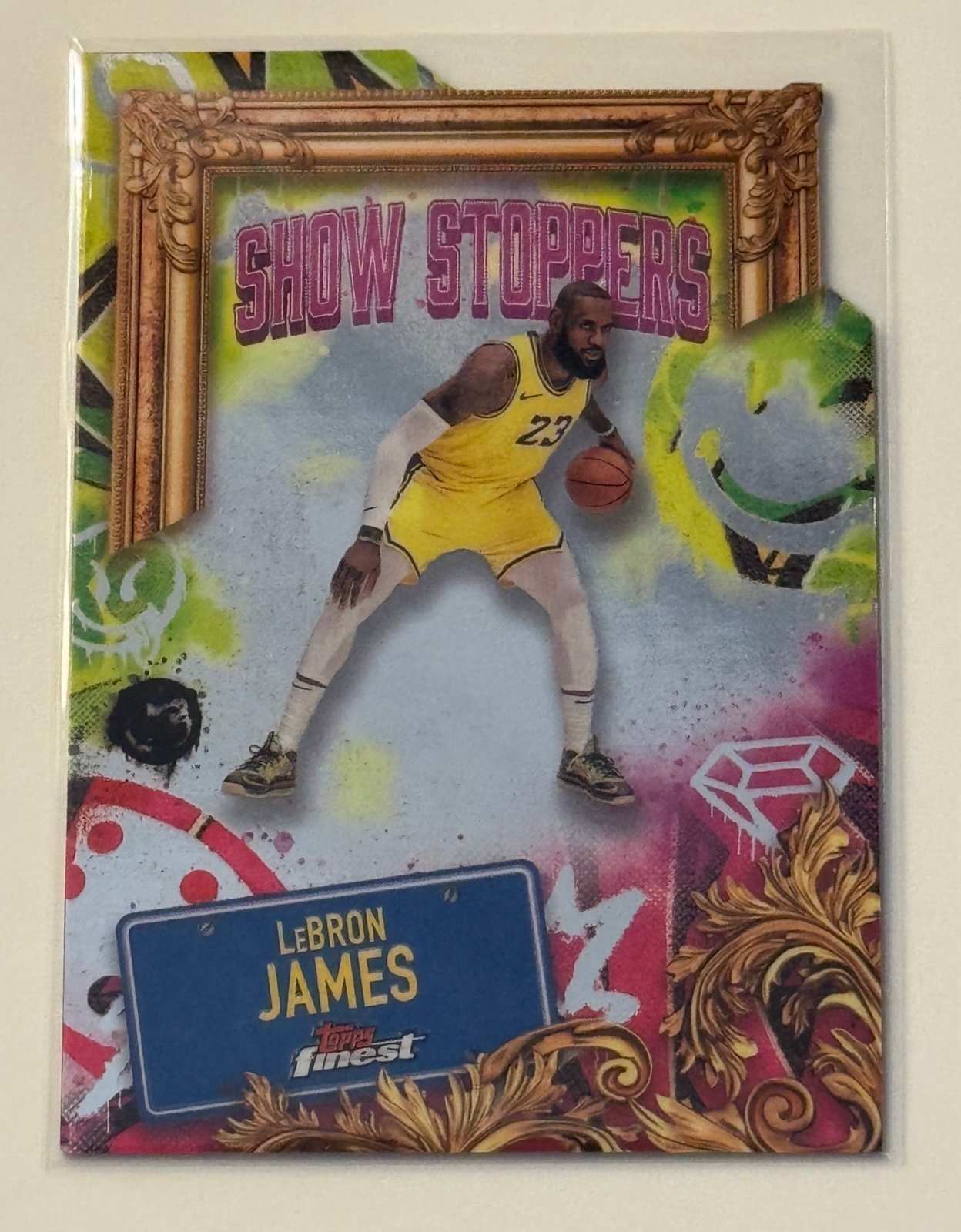 LeBron James 2024 Topps Finest Show Stoppers basketball card in Lakers uniform with vibrant graffiti design