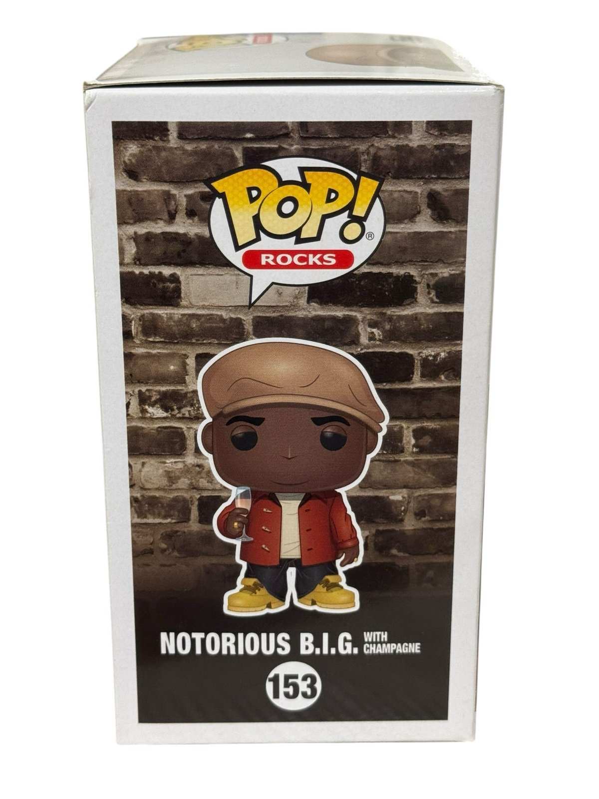 Funko Pop Notorious BIG 153 figure with champagne Hot Topic exclusive packaging