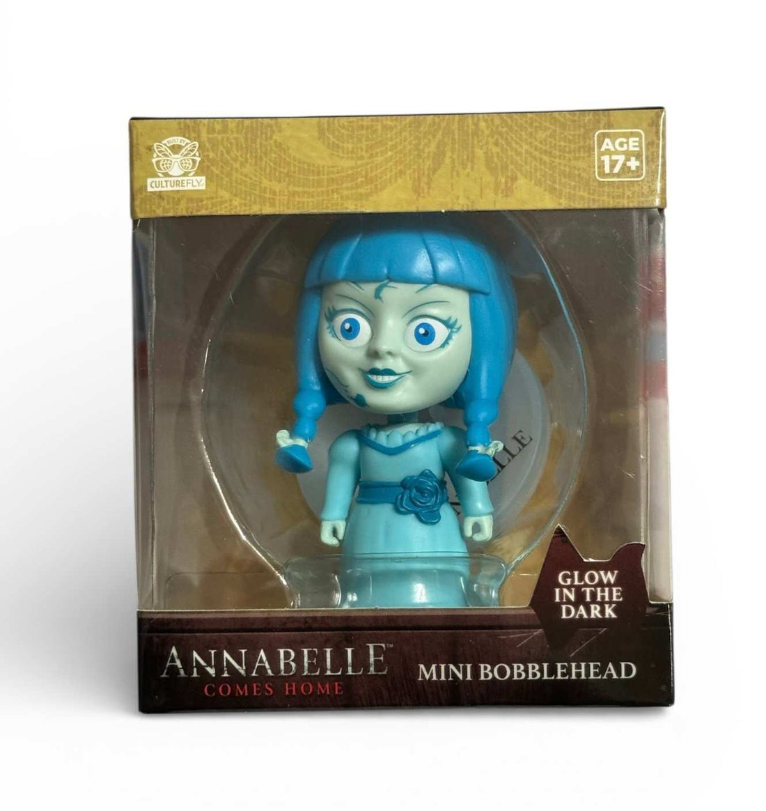Annabelle Comes Home mini bobblehead figure in blue dress with glow in the dark feature in packaging