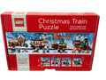 Sealed LEGO Christmas Train Puzzle 4 pack with four connecting 100-piece holiday puzzles in festive train scene box