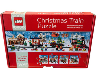 Sealed LEGO Christmas Train Puzzle 4 pack with four connecting 100-piece holiday puzzles in festive train scene box