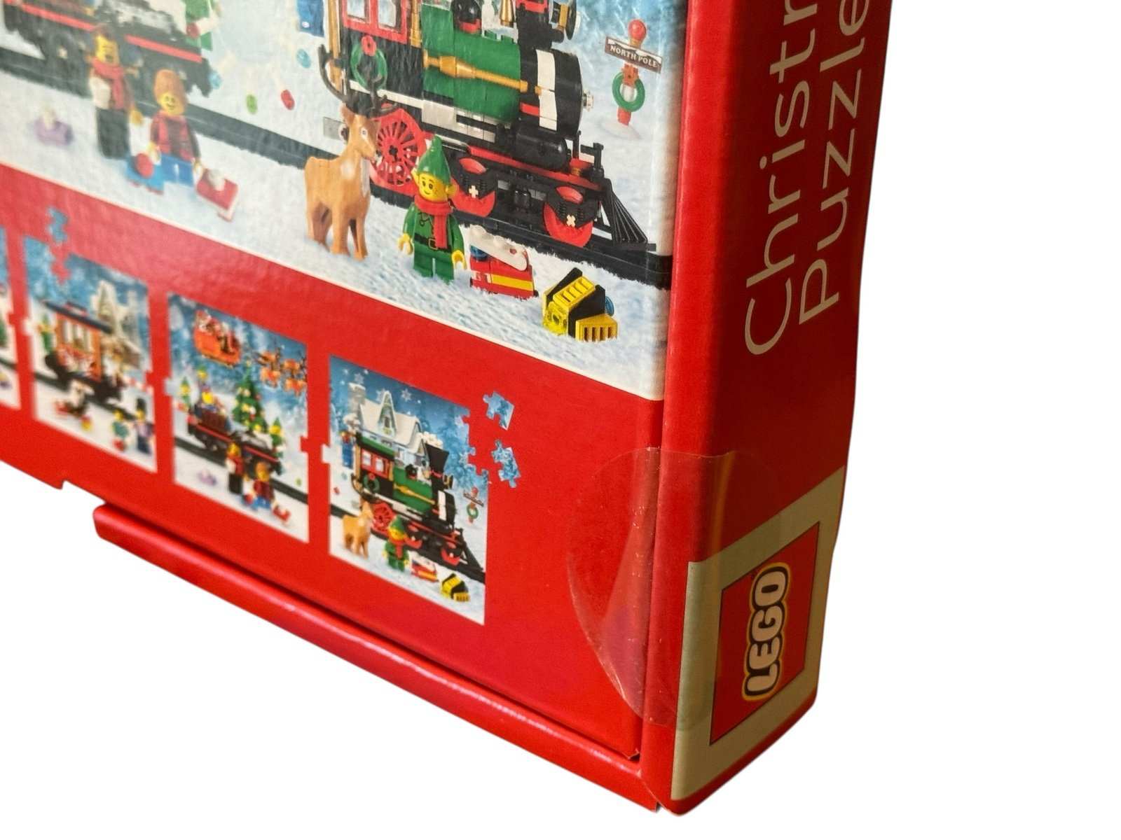 Sealed LEGO Christmas Train Puzzle 4 pack box showing festive holiday train scene and LEGO logo