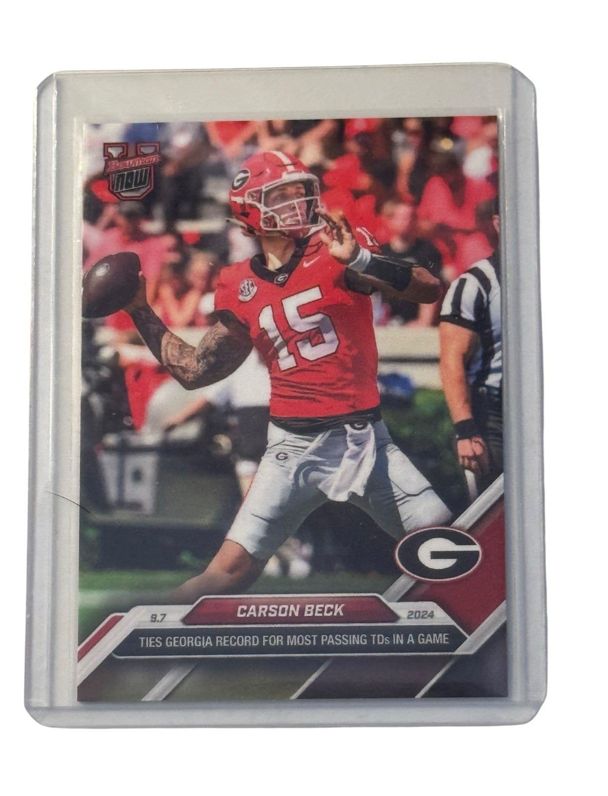 Carson Beck RC Topps Now card showing UGA Bulldogs quarterback in red uniform throwing football, commemorating touchdown record.