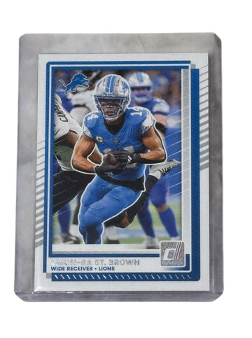 Amon-Ra St. Brown 2021 Donruss NFL Detroit Lions wide receiver football card in protective sleeve