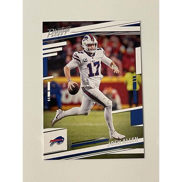 Josh Allen 2022 Panini Prestige NFL Buffalo Bills football card #29 running with football