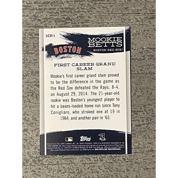 2019 Topps trading card of Mookie Betts in Boston Red Sox uniform with bat raised