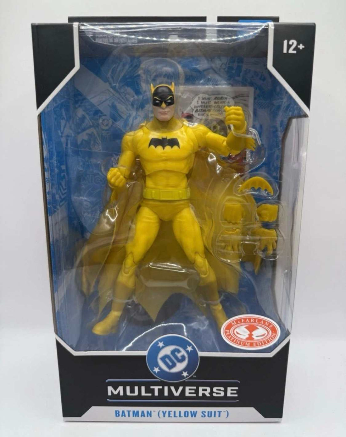 Limited Edition McFarlane DC Multiverse Batman yellow suit action figure with accessories and collector card in packaging