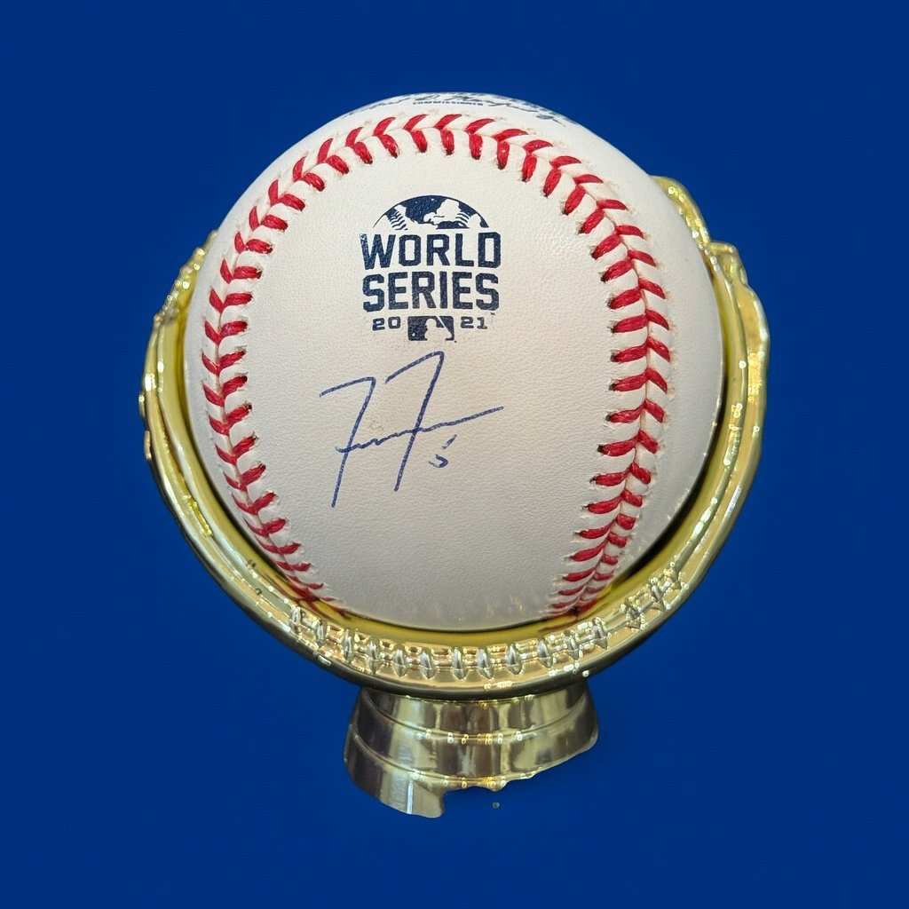 Freddie Freeman signed 2021 World Series baseball with Fanatics authentication displayed on gold stand