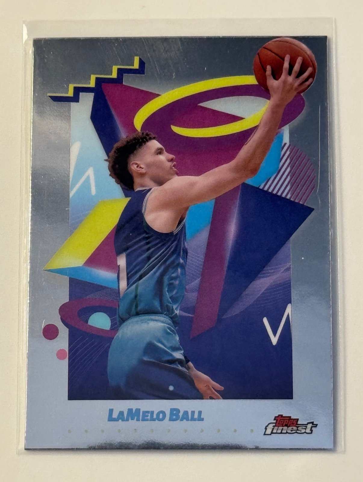 2023-24 Topps Finest LaMelo Ball basketball card #208 Charlotte Hornets with vibrant colors and shine